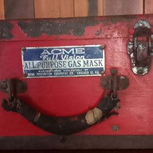 Antique gas mask case with flyer